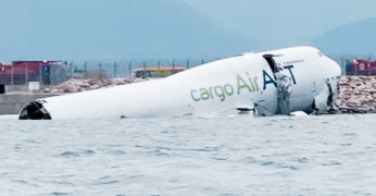 Two killed after cargo plane skids off runway in…..